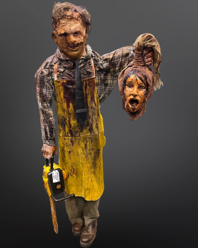 Original Leatherface holding Severed Head